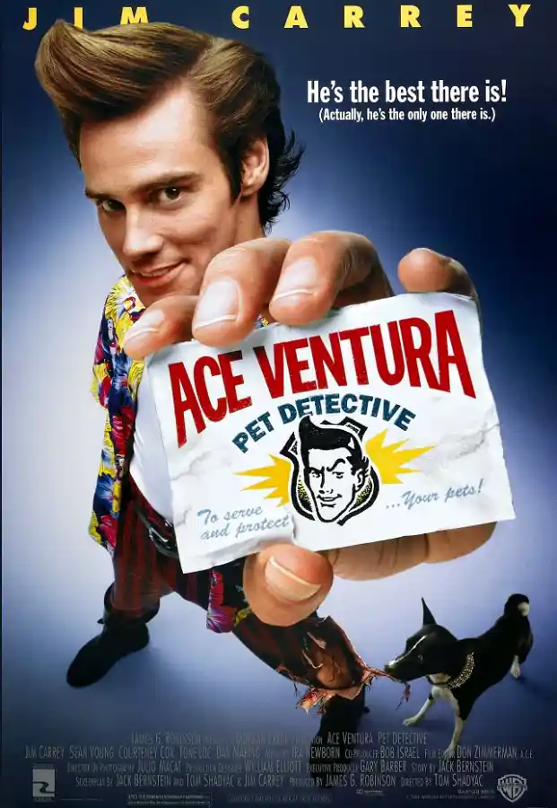 영화 '에이스 벤츄라'의 포스터. 주인공 에이스 벤츄라(짐 캐리)가 화려한 옷을 입고 익살스러운 표정으로 자신의 '동물 탐정' 명함을 보여주고 있다.