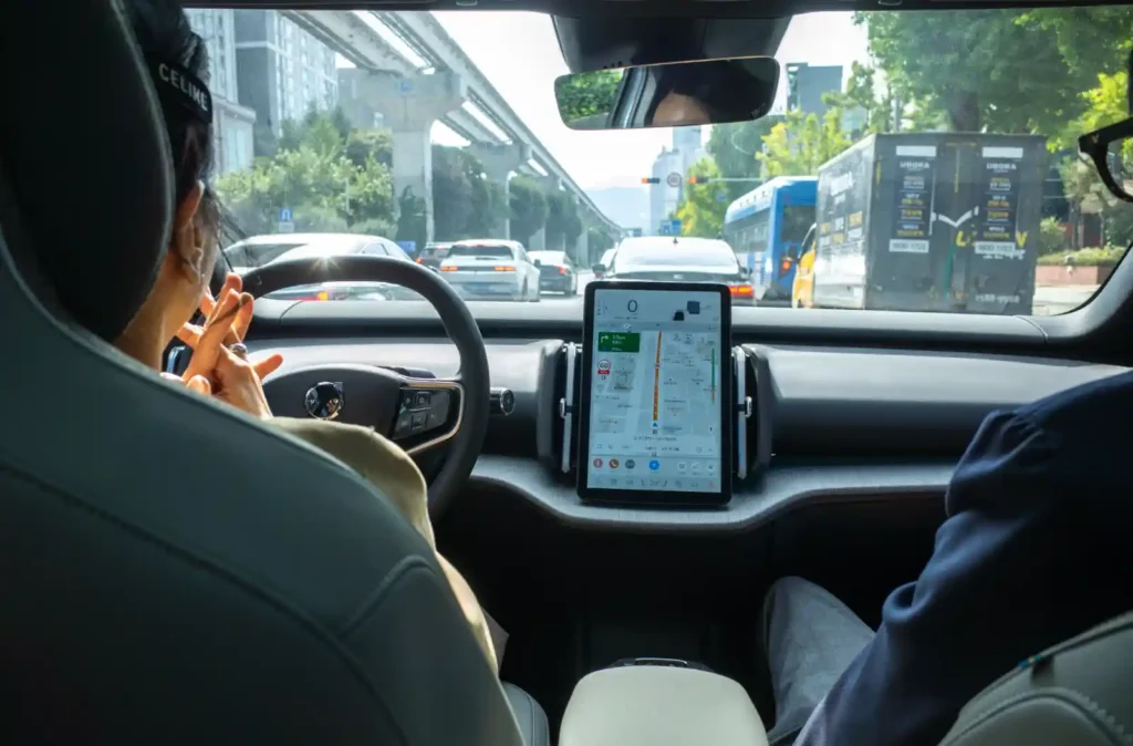 Interior view of Volvo EX30 Cross Country showing vertical center display during test drive in Daegu