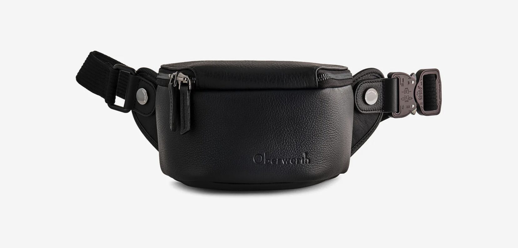 오버베르트 퓨어 슬링백 스몰 - 패브릭과 가죽을 결합한 미니멀 카메라 슬링백